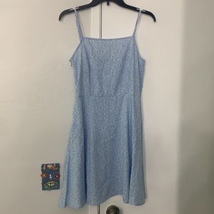 Blue dress with white vine design